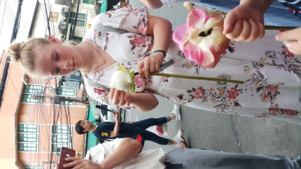 Learning how to fold flower at Pak Khlong Talad